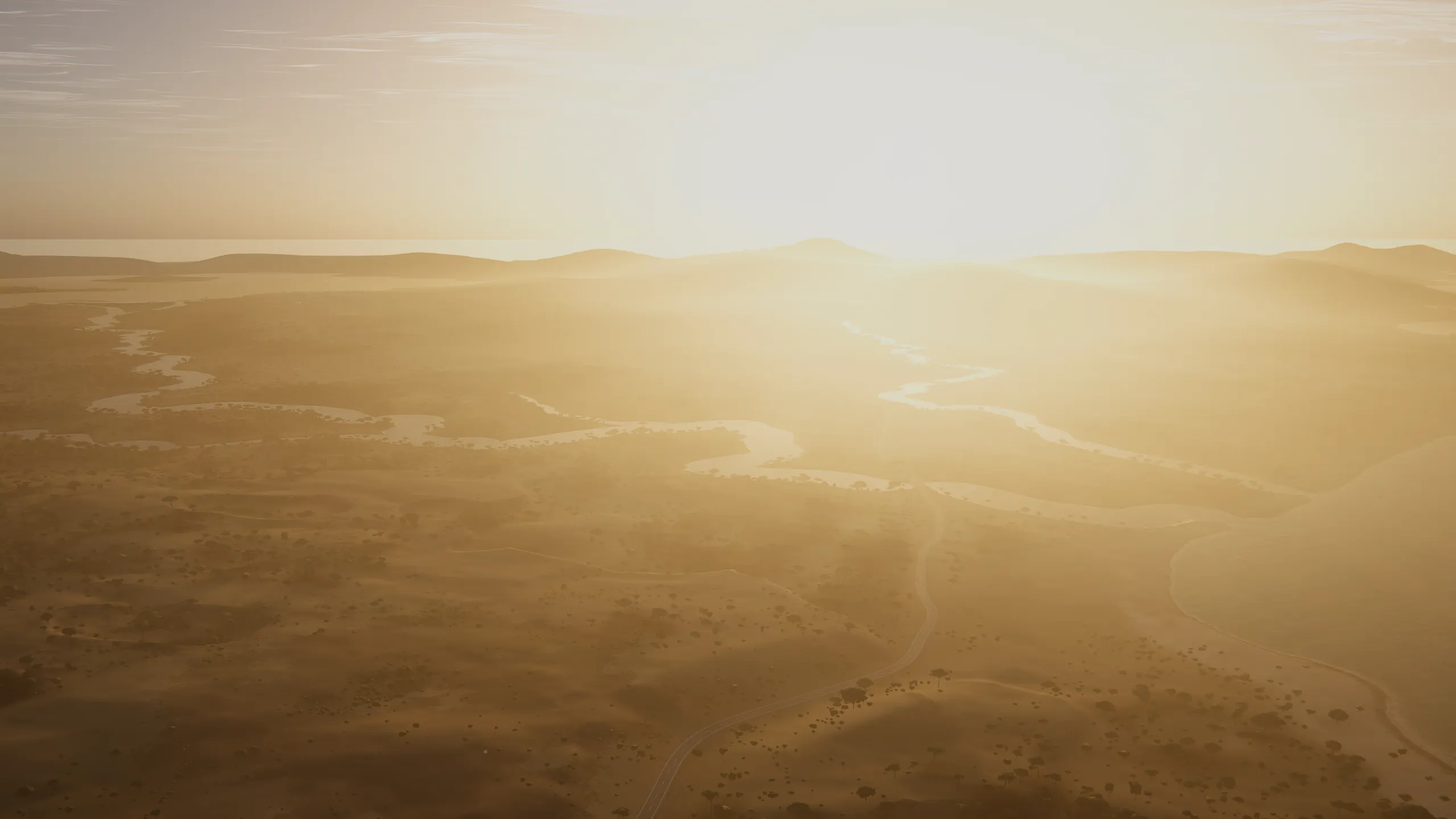 First light over Valta's river country: golden fog fills the valleys and rivers shine toward a rising sun