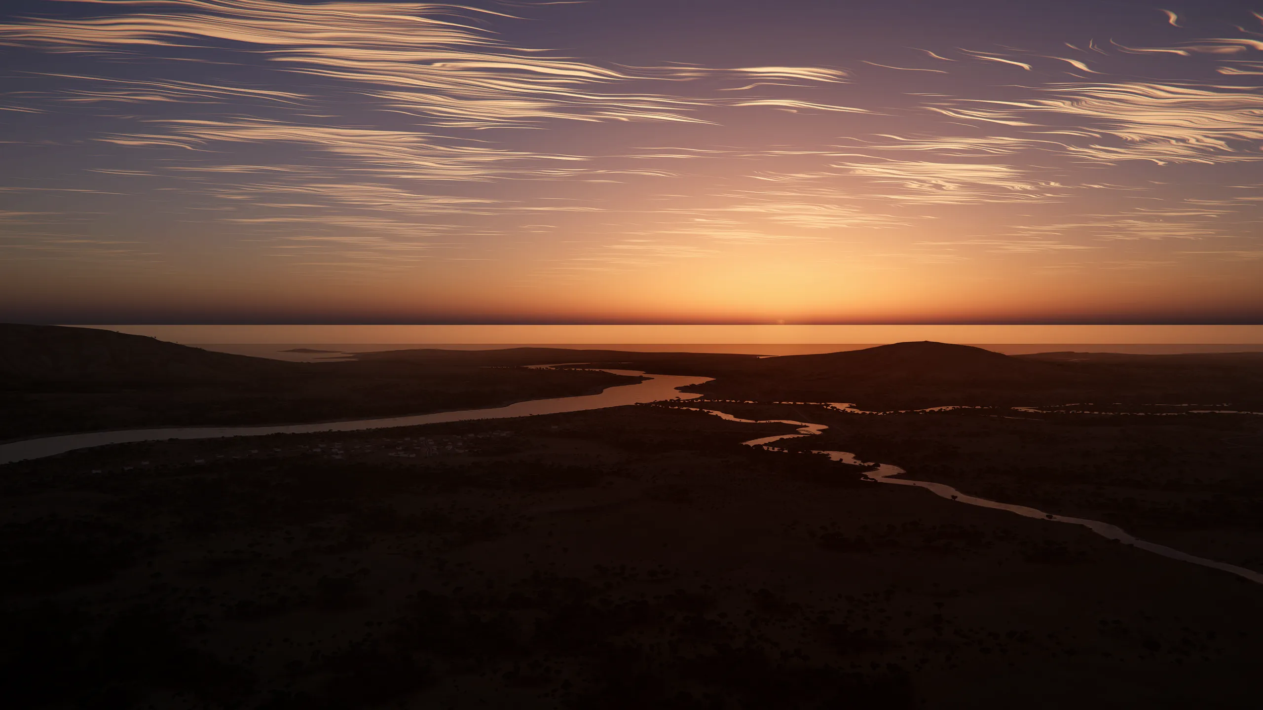 Sunset over a long sea inlet on Valta: a river winds through dark hills toward a glowing horizon under streaked clouds