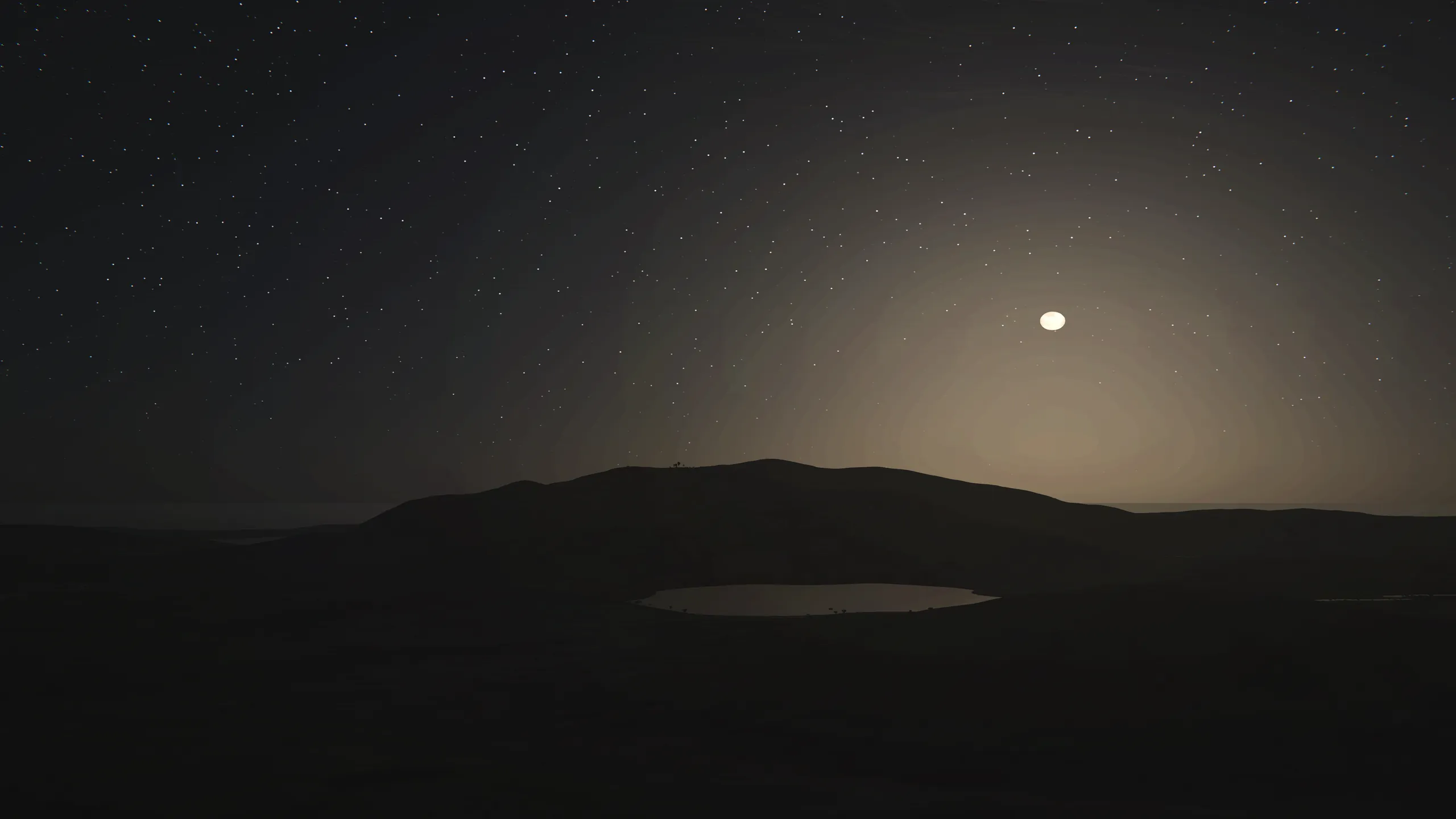 The moon rising over a dark ridge on Valta, stars above and a small lake catching the last light